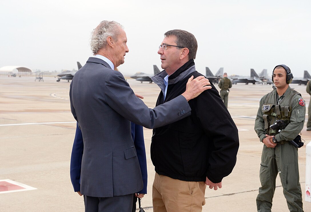 Defense Secretary Ash Carter, right, is greeted by Spanish Defense Minister Pedro Morenes at Morón Air Base, Spain, Oct. 6, 2015. Carter is on a five-day trip to Europe to attend the NATO Defense Ministerial Conference in Brussels and to meet with counterparts in Spain, Italy, and the United Kingdom. DoD photo by U.S. Army Sgt. 1st Class Clydell Kinchen