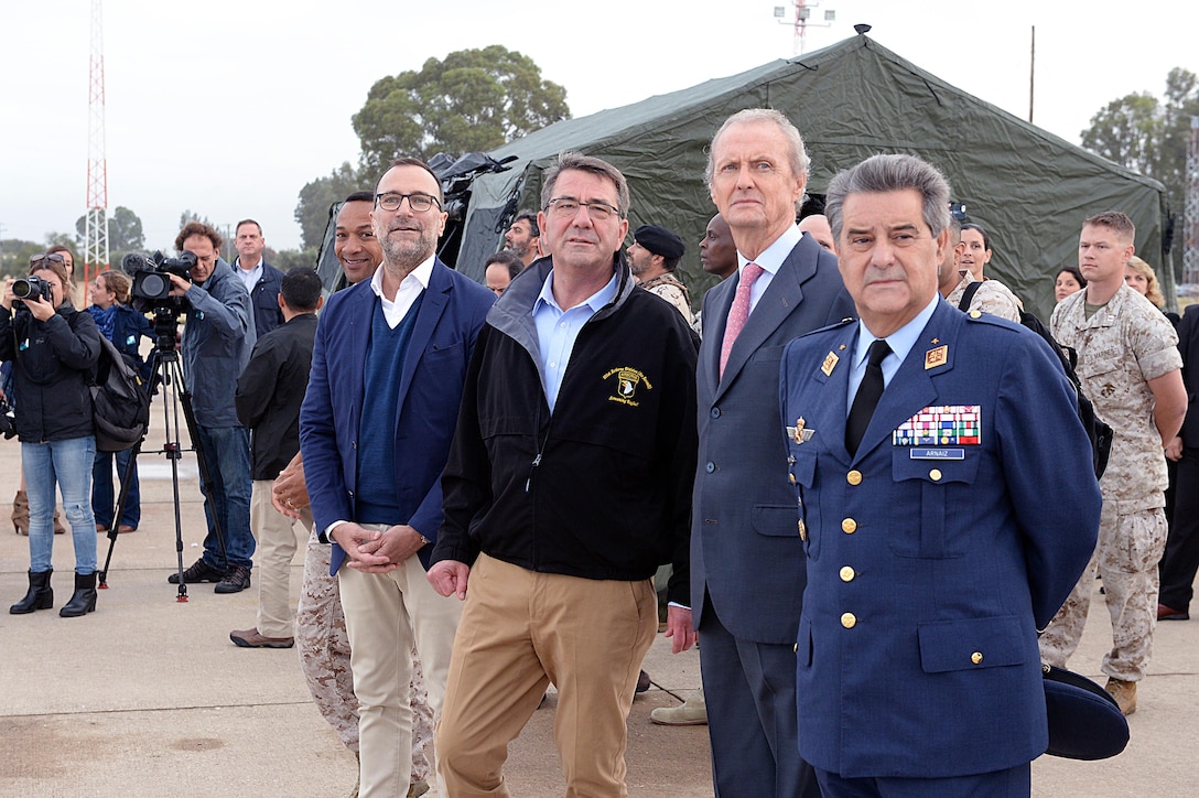 Right to left: Spanish Air Force Chief of Staff Gen. F. Javier García Arnaiz, Spanish Defense Minister Pedro Morenes, U.S. Defense Secretary Ash Carter and U.S. Ambassador to Spain James Costos observe an airfield seizure bilateral capabilities exercise on Morón Air Base, Spain, Oct. 6, 2015. Carter is on a five-day trip to Europe to attend the NATO Defense Ministerial Conference in Brussels, Belgium, and meet with counterparts in Spain, Italy and the United Kingdom. DoD photo by U.S. Army Sgt. 1st Class Clydell Kinchen