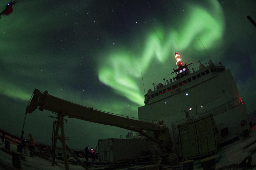 The aurora borealis are visible over the Coast Guard Cutter Healy in the Arctic Ocean, Oct. 4, 2015. The Healy is supporting the National Science Foundation-funded Arctic Geotraces project, part of an international effort to study the distribution of trace elements in the world's oceans. U.S. Coast Guard photo by Petty Officer 2nd Class Cory J. Mendenhall