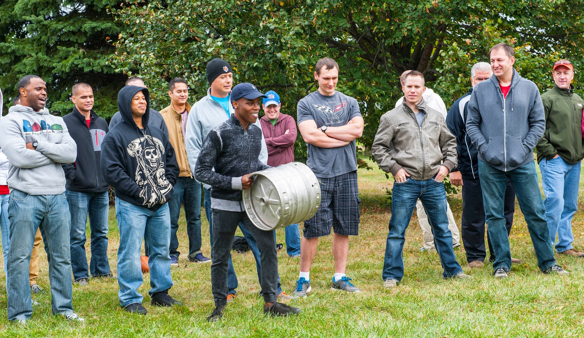 WRIGHT PATTERSON AIR FORCE BASE, Ohio -- Airman 1st Class Michael Robinson, National Air and Space Intelligence Center, prepares to test his strength in the keg toss competition at the center's 47th Annual Oktoberfest Celebration at Bass Lake, Oct. 6, 2015. During the celebration different units within the center competed in the Oktoberfest games while enjoying traditional German cuisine. (U.S. Air Force photo by Tech. Sgt. Eunique P. Thomas) 