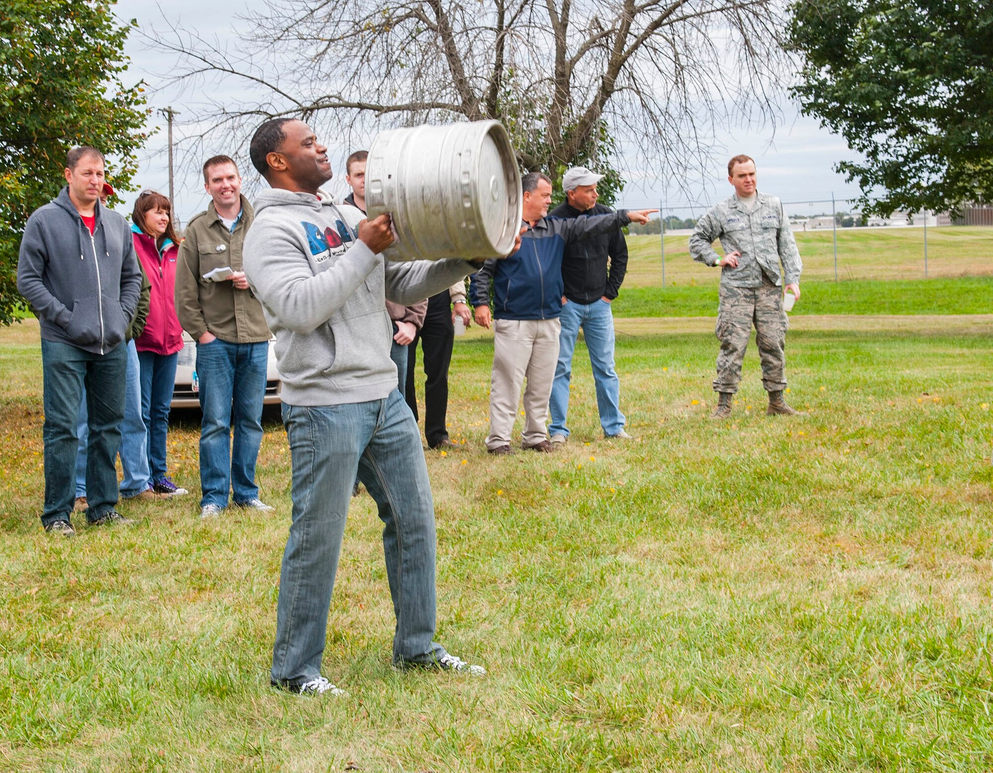WRIGHT PATTERSON AIR FORCE BASE, Ohio -- Senior Master Sgt Elgin Burton, National Air and Space Intelligence Center, competes in the keg toss competiotion during the center's 47th Annual Oktoberfest celebration at Bass Lake, Oct. 6, 2015. During the celebration different units within the center compete in the Oktoberfest games while enjoying traditional German cuisine. (U.S. Air Force photo by Tech. Sgt. Eunique P. Thomas)