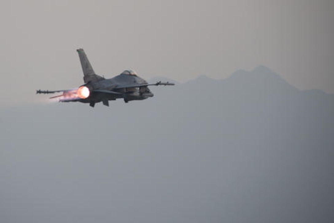 A U.S. Air Force F-16 Fighting Falcon aircraft assigned to the 555th Expeditionary Fighter Squadron takes off on a combat sortie from Bagram Air Field, Afghanistan, Aug. 24. The F-16 is fitted with the F-100 series engine by General Electric, now stored and delivered for select Air Force maintenance customers out of DLA Distribution’s site in Oklahoma City, Okla. 