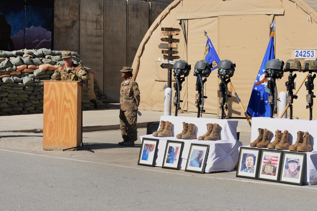 U.S. Air Force Lt. Col. Mitchell Spillers speaks at a memorial ceremony for six fallen U.S. airmen on Bagram Airfield, Afghanistan, Oct. 3, 2015. Spillers is commander of the 774th Expeditionary Airlift Squadron. U.S. Air Force photo by Senior Airman Cierra Presentado