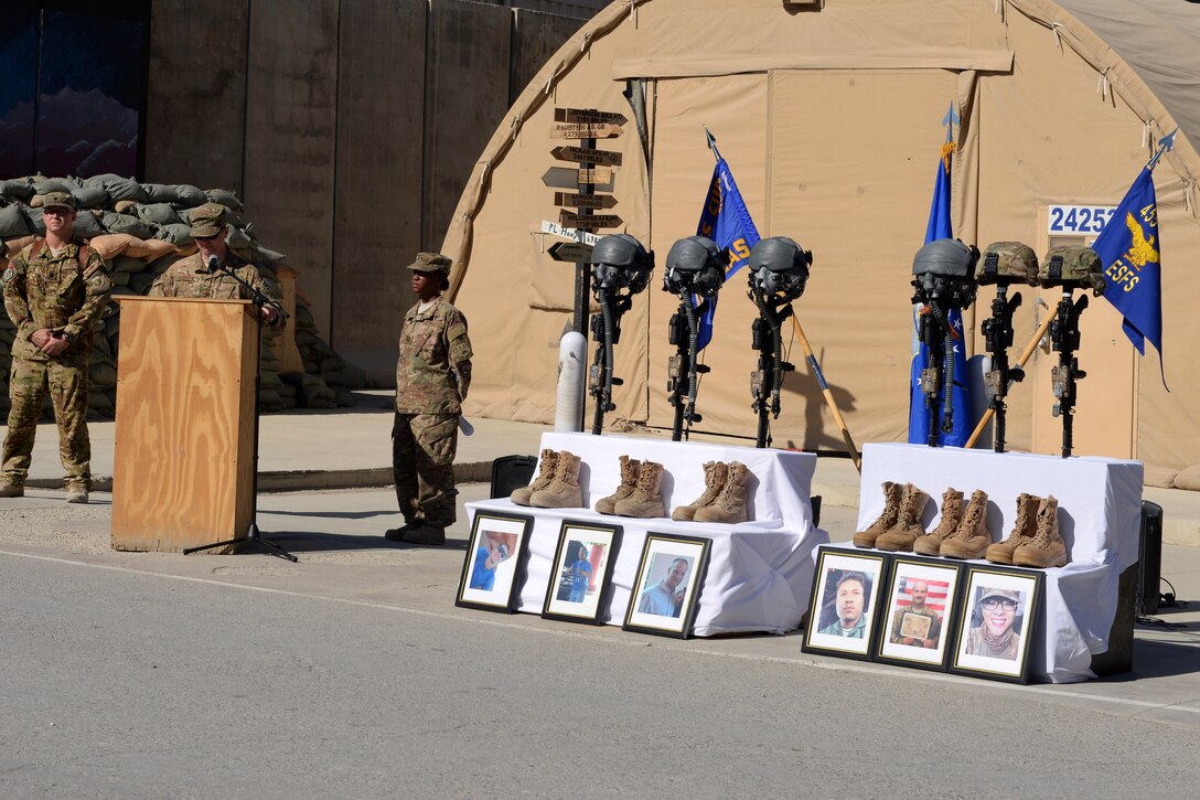U.S Air Force Maj. Met Berisha speaks at a memorial ceremony for six fallen U.S. airmen on Bagram Airfield, Afghanistan, Oct. 3, 2015. Berisha is commander of the 455th Expeditionary Security Forces Squadron. U.S. Air Force photo by Senior Airman Cierra Presentado