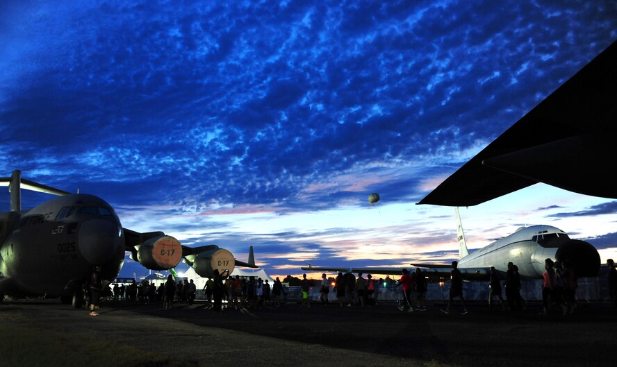 Marathon participants walk to the starting line for the 19th Annual U.S. Air Force Marathon, Sept. 19, 2015, near Wright-Patterson Air Force Base, Ohio. Thousands of runners and cclists from across the country attended the three-day event that began Sept. 17 and included a Sport and Fitness Expo, Gourmet Pasta Dinner and a full, and half marathon, 10K, and 5K race. (U.S. Air Force photo by Senior Airman Matthew Lotz)