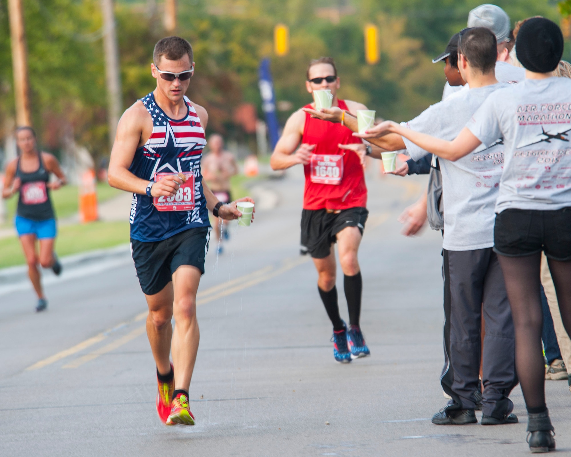 Racers compete during the 19th Annual U.S. Air Force Marathon Saturday, Sept. 19, 2015, on Wright-Patterson Air Force Base, Ohio. The marathon maxed out its entries with 15,000 competitors racing in the 10-kilometer, half marathon, and full marathon; along with more than 2,000 service members running in deployed locations around the world. The first Air Force Marathon took place in 1997 and had 2,600 racers. (U.S. Air Force photo by Tech. Sgt. Eunique Thomas)