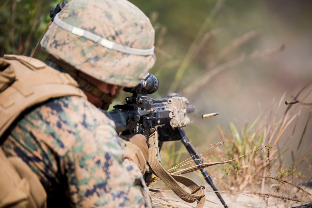 U.S. Marine Lance Cpl. Michael W. Silver provides suppressive fire during Korean Marine Exchange Program 15-12 at Rodriguez Landing Zone, Republic of Korea, Sept. 25, 2015. KMEP 15-12 is a bilateral training exercise that enhances the ROK and U.S. alliance, promotes stability on the Korean Peninsula and strengthens ROK and U.S. military capabilities and interoperability. Silver, from Carrollton, Georgia, is a rifleman with Fox Company, 2nd Battalion, 3rd Marine Regiment, currently assigned to 4th Marine Regiment, 3rd Marine Division, III Marine Expeditionary Force under the unit deployment program.