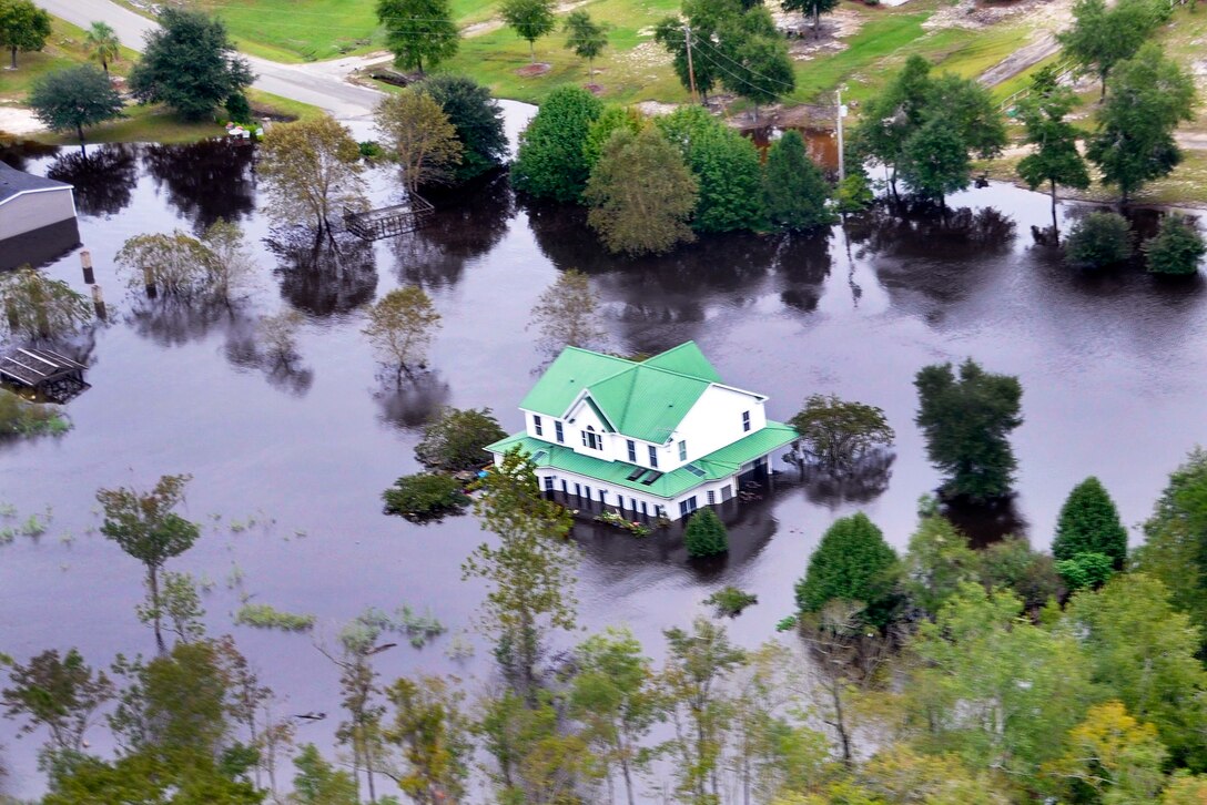 An aerial view taken from a Coast Guard helicopter showing the continuing effects of flooding caused by Hurricane Joaquin in the area of the Black River, in Sumpter County, S.C., Oct. 6, 2015. U.S. Coast Guard photo by Petty Officer 1st Class Stephen Lehmann 