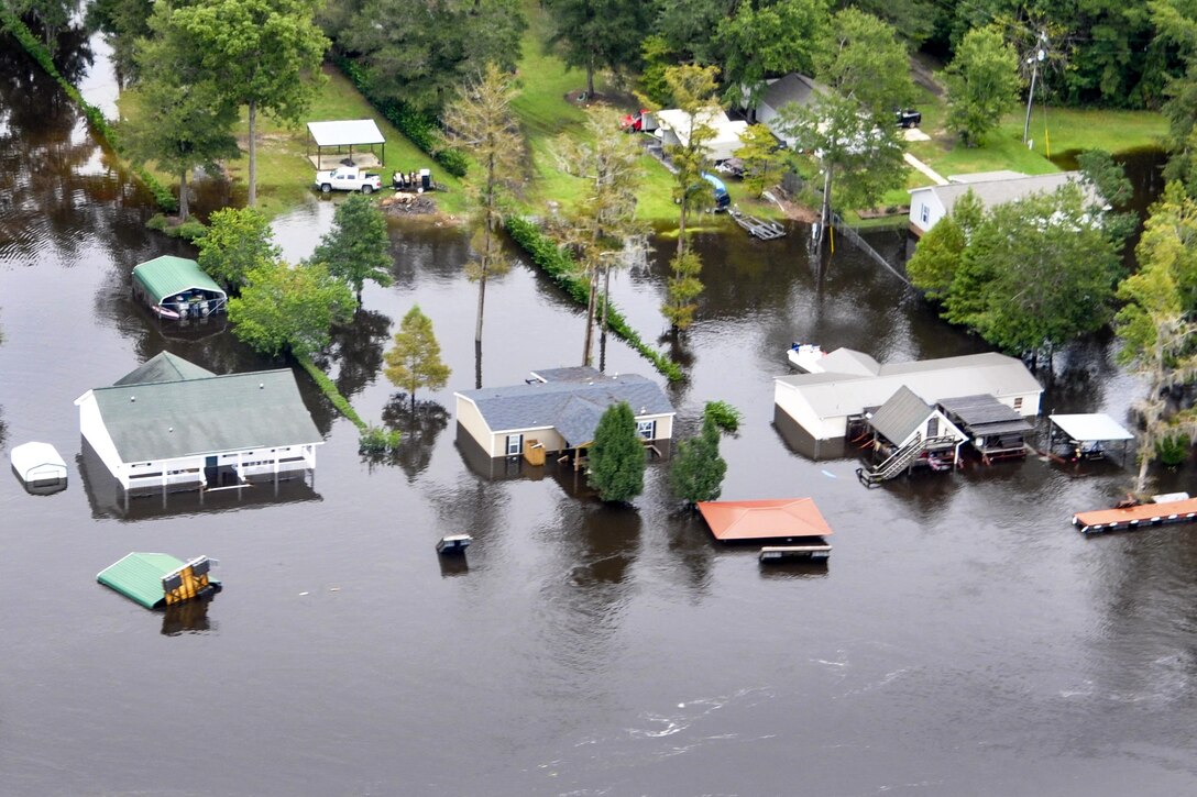 An aerial view taken from a Coast Guard helicopter showing the continuing effects of flooding caused by Hurricane Joaquin in the area of the Black River, in Sumpter County, S.C., Oct. 6, 2015. U.S. Coast Guard photo by Petty Officer 1st Class Stephen Lehmann 
