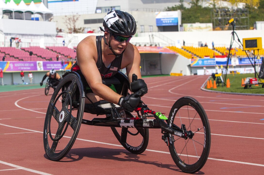 U.S. track athlete Ivan Sears wins the Men’s 200-meter Para Final (Class D) during the 6th Military World Games in Mungyeong, South Korea, Oct. 7, 2015. U.S. Marine Corps photo by Sgt. Ashley N.Cano