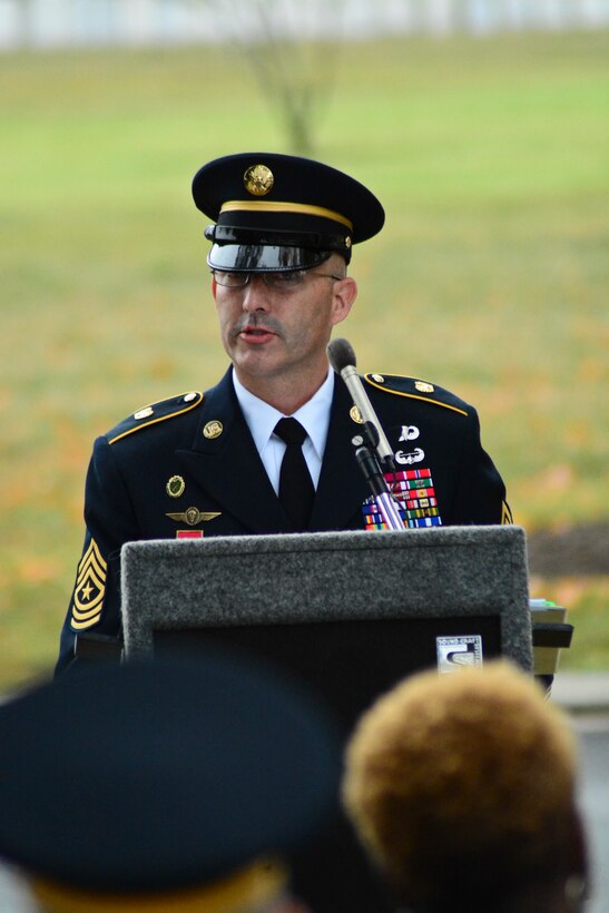 Sgt. Maj. Timothy Fitzgerald, the provost marshal general sergeant major, gives remarks at Arlington National Cemetery for the Military Police Corps Regimental Remembrance Ceremony held Sept. 30. Guests pay special tribute to the Military Police who sacrificed their lives while serving during the last year (U.S. Army photo taken by Sgt. Elizabeth Taylor/released)