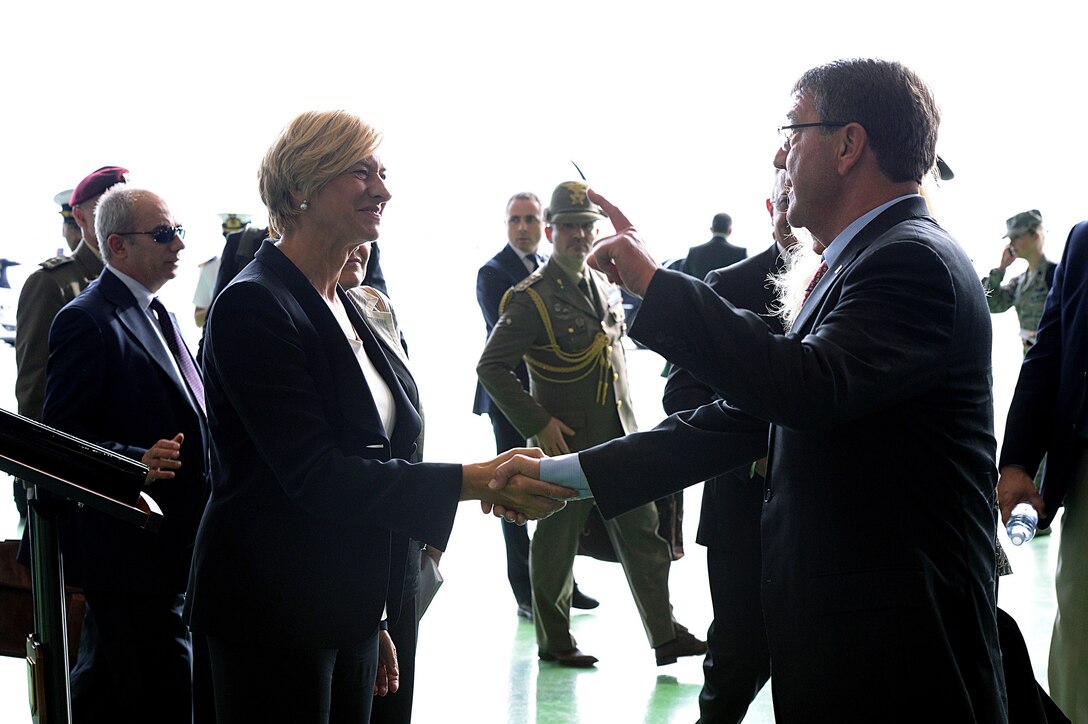 U.S. Defense Secretary Ash Carter exchanges greetings with Italian Defense Minister Roberta Pinotti at Sigonella, Italy, Oct. 6, 2015. DoD photo by U.S. Army Sgt. 1st Class Clydell Kinchen