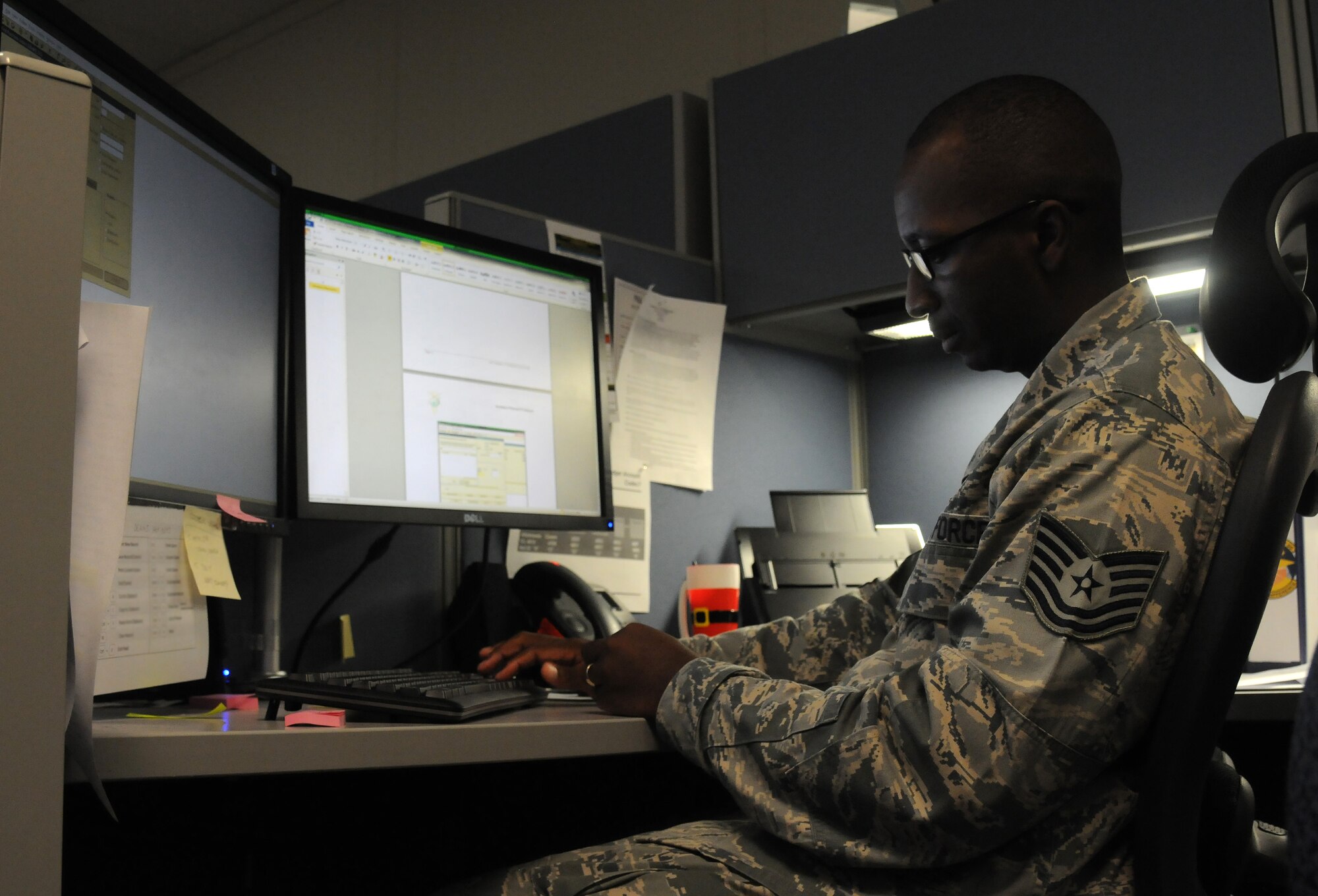 Tech. Sgt. Travis Spencer, 81st Comptroller Squadron financial analysis section chief, updates funding balances in accounting systems during the end-of-year close out, Sept. 30, 2015, Keesler Air Force Base, Miss. The close out consisted of more than 200 members from the 81st CPTS financial management analysis office, 81st Contracting Squadron, 81st Civil Engineer Squadron, 81st Logistics Readiness Squadron and the 81st Communications Squadron ensuring funds were ready for operational needs and that all of the financial obligations were recorded and valid by Sept. 30 so no Keesler funds were lost. (U.S. Air Force photo by Senior Airman Holly Mansfield)