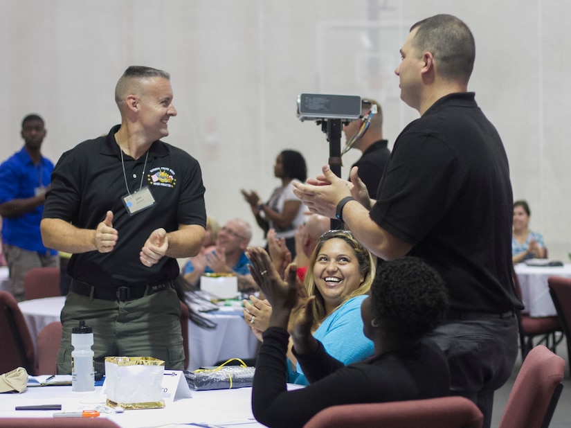 Command teams participating in the 200th Military Police Command's Family Readiness Training in Shepherdstown, W.Va., are celebrated during the welcome ceremony, Sept. 18. The event provided participants with the tools necessary to successfully  develop a Family Readiness Group.