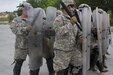 U.S. Soldiers from the 1st Battalion, 252nd Armor Regiment, perform commands given during crowd and riot control training June 15 at the Joint Multinational Readiness Center in Hohenfels, Germany. The training is being conducted in preparation for a peacekeeping mission in Kosovo.