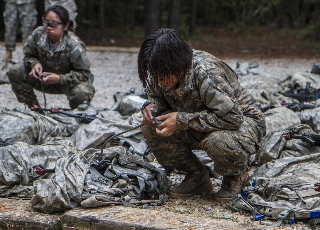 Army Pvt. Tanica Marco, B Company, 3rd Battalion, 34th Infantry Regiment, takes a water break after completing the Fit to Win endurance course on Fort Jackson, S.C., Oct. 1, 2015. Marco's unit is currently in their second week of basic combat training. (U.S. Army photo by Sgt. 1st Class Brian Hamilton)