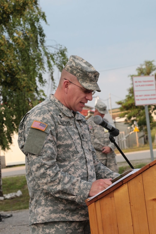 U.S. Army Capt. David Watters, the chaplain for 1st Combined Arms Battalion, 252nd Armor Regiment, out of Fayetteville, N.C., gives the invocation at a Hand Over-Turn Over ceremony July 4, 2015, at Camp Marechal de Lattre de Tassigny, Kosovo. The battalion assumed responsibility over the Multinational Battle Group-East Forward Command Post in support of the NATO peace support mission in Kosovo. (U.S. Army photo by Sgt. Gina Russell, Multinational Battle Group-East)