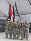 A U.S. Army color guard presents the colors for the United States; NATO; 4th Infantry Brigade Combat Team (Airborne), 25th Infantry Division; and 30th Armored Brigade Combat Team during a Multinational Battle Group-East transfer of authority ceremony July 9, 2015, at Camp Bondsteel, Kosovo. The 30th ABCT, an Army National Guard unit from North Carolina, will lead a multinational force supporting NATO’s peace mission in Kosovo for approximately nine months. (U.S. Army photo by Sgt. Erick Yates, Multinational Battle Group-East)