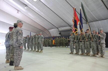 A U.S. Army color guard presents the colors for the United States; NATO; 4th Infantry Brigade Combat Team (Airborne), 25th Infantry Division; and 30th Armored Brigade Combat Team during a Multinational Battle Group-East transfer of authority ceremony July 9, 2015, at Camp Bondsteel, Kosovo. The 30th ABCT, an Army National Guard unit from North Carolina, will lead a multinational force supporting NATO’s peace mission in Kosovo for approximately nine months. (U.S. Army photo by Sgt. Erick Yates, Multinational Battle Group-East)