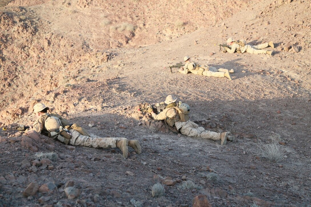 ARTA BEACH, Djibouti (Sept. 29, 2015) U.S. Marines with the 15th Marine Expeditionary Unit provide security for their squad while patrolling during a desert survival course with the French 5th Overseas Combined Arms Regiment (RIAOM). Elements of the 15th MEU are training with the 5th RIAOM in Djibouti in order to improve interoperability between the MEU and the French military. (U.S. Marine Corps photo by Sgt. Steve H. Lopez/Released)