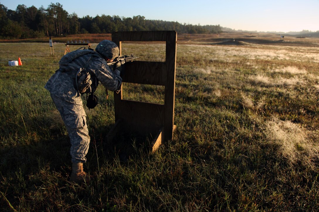 Army Pfc. David Saunders qualifies with an M4 carbine during the U.S. Army’s Best Warrior Competition on Fort A.P. Hill, Va., Oct. 6, 2015. The weeklong competition tests the skills, knowledge and professionalism of 26 warriors representing 13 commands. Saunders is assigned to 3rd U.S. Infantry Regiment (The Old Guard). U.S. Army photo by Pfc. Christopher Brecht