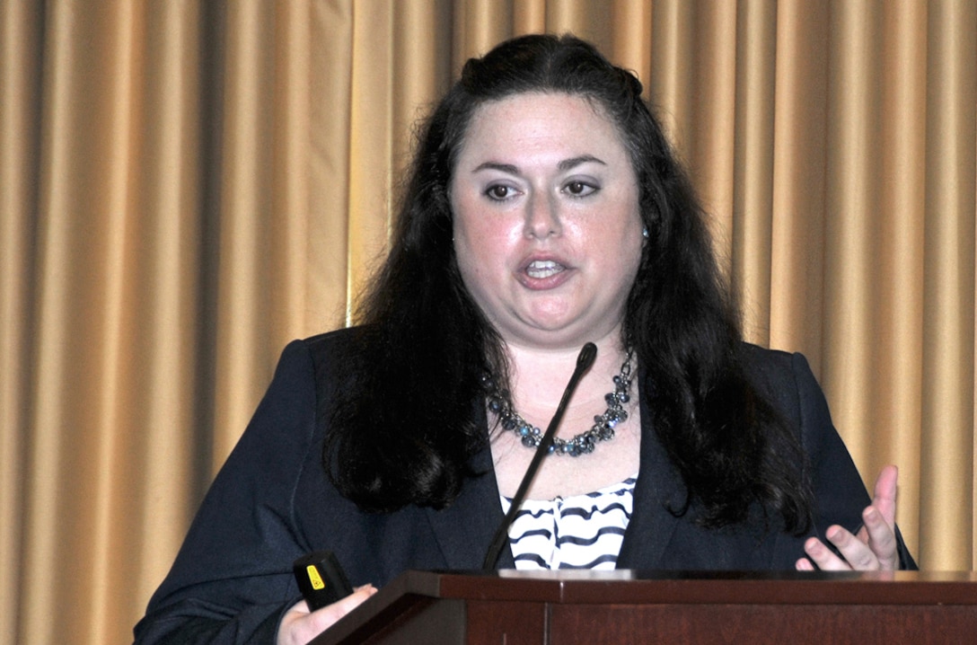 Melissa Brand, an appellate review attorney for the Equal Employment Opportunity Commission, describes types of discrimination during a Lesbian, Gay, Bisexual, Transgender Pride Month observance at the HQC June 17.