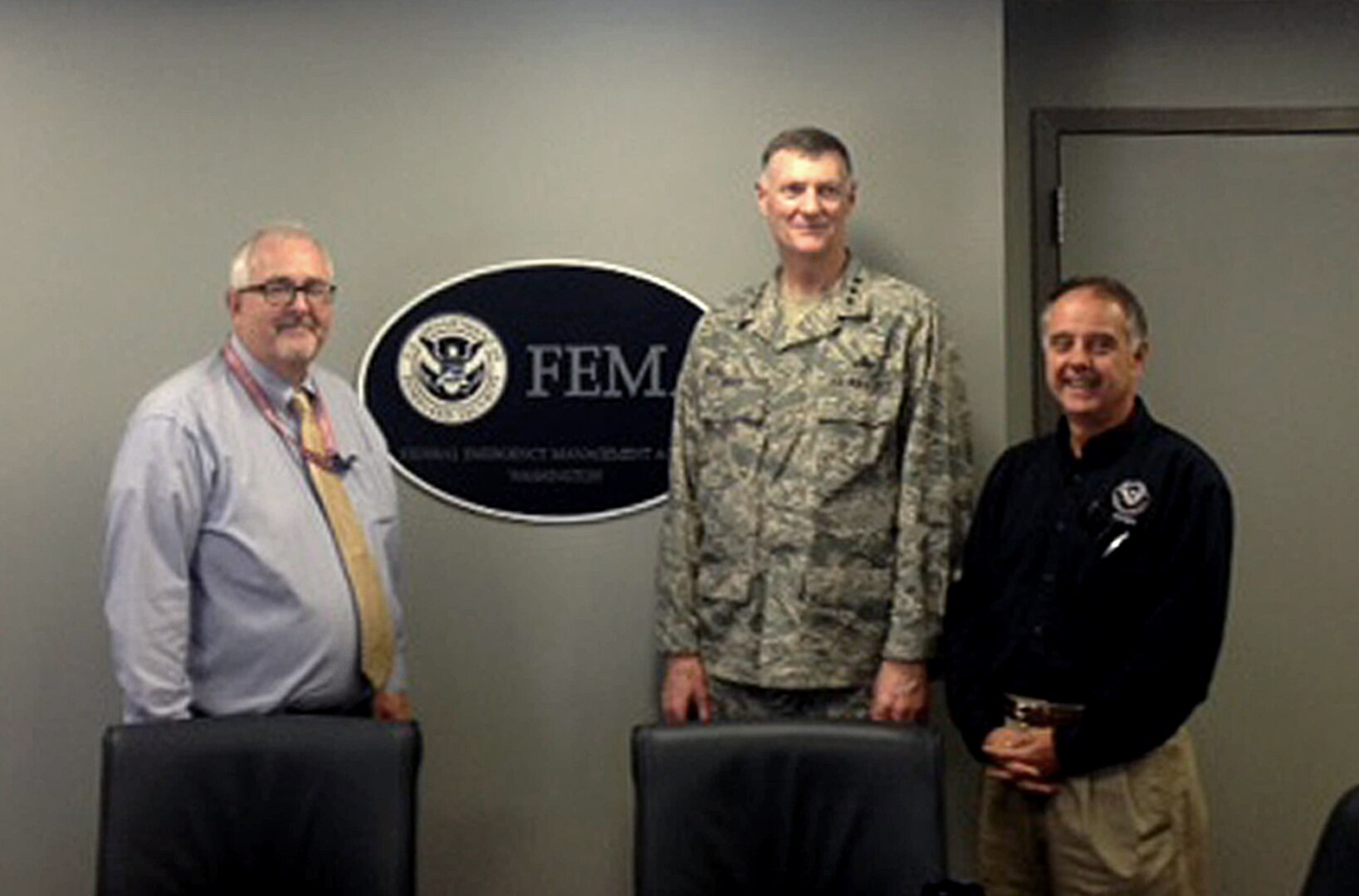(From left) Federal Emergency Management Agency Administrator Craig Fugate, Defense Logistics Agency Director Air Force Lt. Gen. Andy Busch and FEMA Deputy Administrator Joseph Nimmich meet June 12 at FEMA’s headquarters in Washington, D.C. Busch toured the agency’s 24/7 National Response Coordination Center, the focal point for national disaster coordination, where he learned firsthand about the support DLA provides to FEMA. 