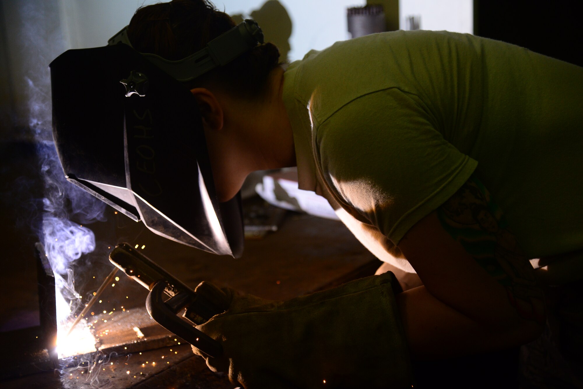 Staff Sgt. Bethanie Jeremenko, a 51st Civil Engineer Squadron structural craftsman, uses an arc welder to repair an L-joint as part of a demonstration at Osan Air Base, Republic of Korea, July 30, 2015. Whether cutting, painting, welding or building, no job is too big or too small for an Airman of the 51st Civil Engineer Squadron structures shop.
(U.S. Air Force photo/Staff Sgt. Amber Grimm)
