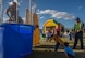 A Team Holloman dependent aims for the target at the dunk tank during the annual National Night Out event hosted by Soaring Heights Communities at Holloman Air Force Base, N.M., Oct. 6. This is the eighth year Soaring Heights has hosted the event and brought together law enforcement, fire protection and community support agencies to provide Holloman residents information and child safety material. Every year, Holloman Airmen and local community members gather at Soaring Heights which offers them food, music and various events for children to enjoy. (U.S. Air Force photo by Senior Airman Aaron Montoya)