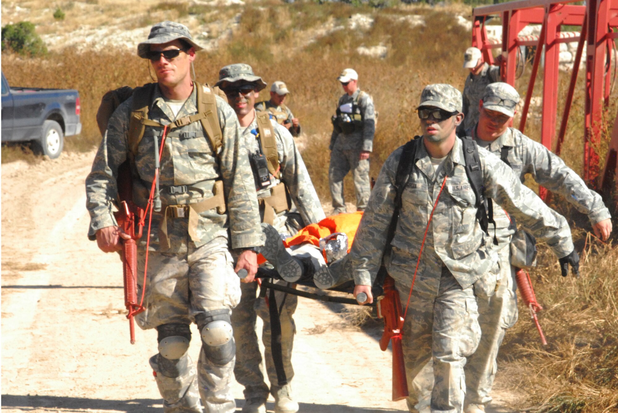 Airmen from the 460th Medical Group use a liter to carry a patient during a training exercise Oct. 3, 2015, at Fort Carson, Colo. The 460th MDG completed annual combat leadership and combat medic training in order to prepare themselves for situations they could find themselves in while deployed in a hostile environment. (Courtesy photo)