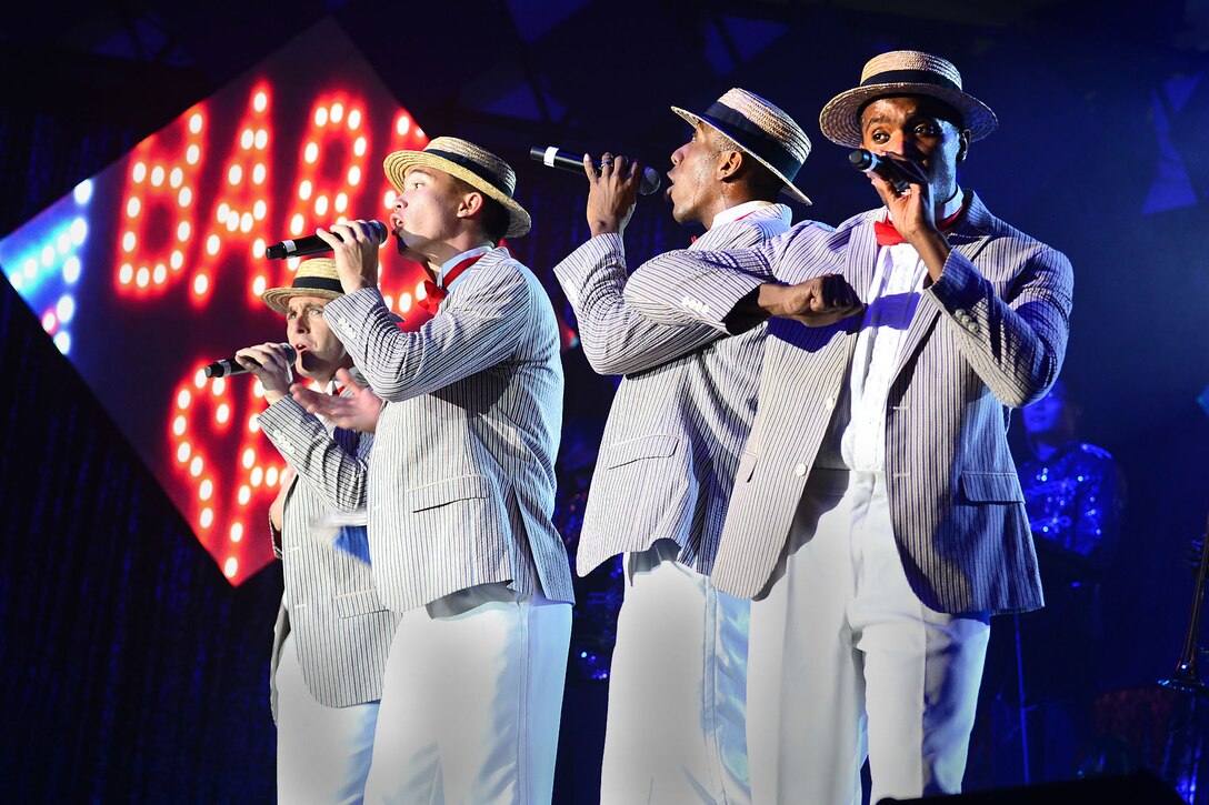 U.S. Air Force members of Tops in Blue, perform during a show at the Hampton Roads Convention Center in Hampton, Va., Oct. 6, 2015. The vocalists are part of the traveling performance group, which is one of the oldest and most widely traveled entertainment groups of its kind. (U.S. Air Force photo by Senior Airman Kimberly Nagle/Released)
