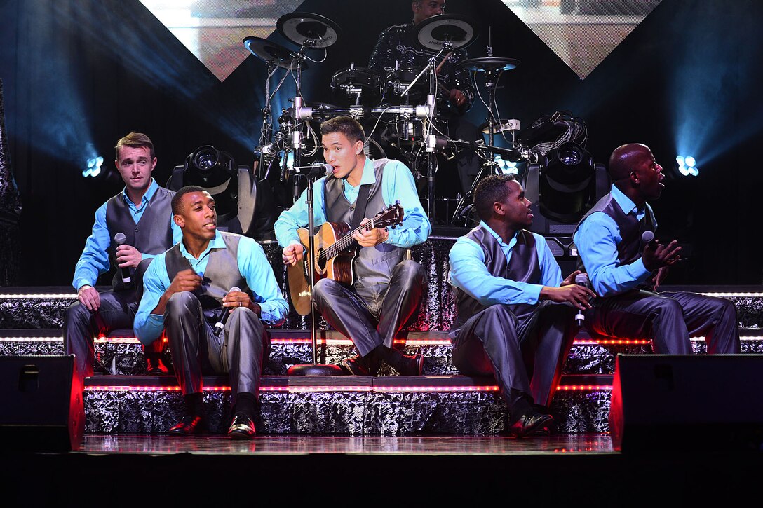 Members of the 2015 Tops in Blue tour perform at the Hampton Roads Convention Center in Hampton, Va., Oct. 6, 2015. Tops in Blue is an all active-duty U.S. Air Force Expeditionary Entertainment Unit composed of 35 to 40 vocalists, musicians, dancers and technicians. (U.S. Air Force photo by Senior Airman Kimberly Nagle/Released)