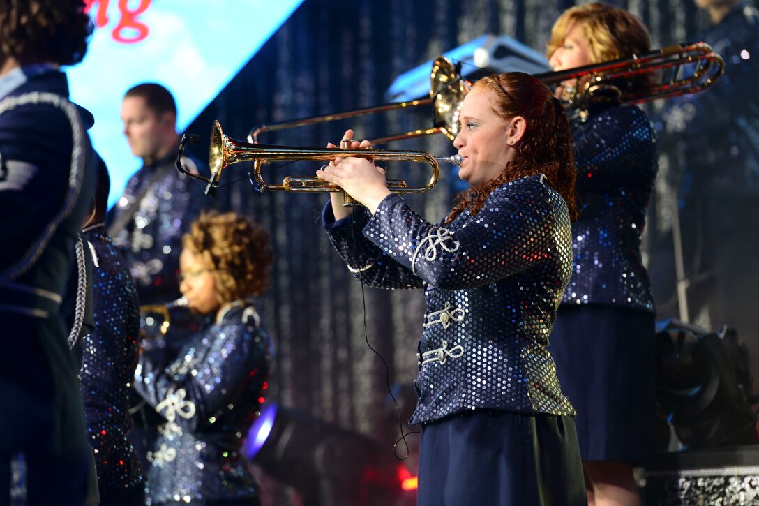 U.S. Air Force Airmen assigned to Tops in Blue perform the national anthem at the Hampton Roads Convention Center in Hampton, Va., Oct. 6, 2015. This year’s performance takes the group throughout the United States and to more than 20 countries around the world. (U.S. Air Force photo by Staff Sgt. Ciara Gosier/Released)