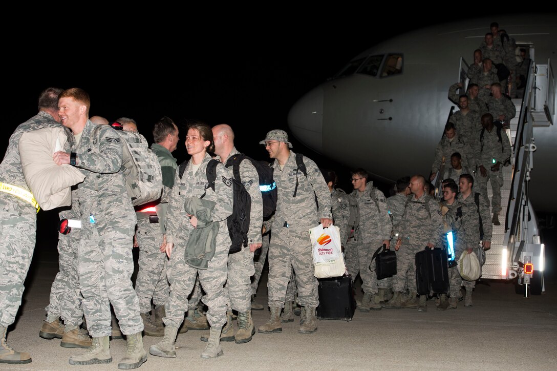 U.S. Air Force Airmen return from a six-month deployment to the Middle East at Langley Air Force Base, Va., Oct. 5, 2015. During the deployment, approximately 200 Service members from the 1st and 192nd Fighter Wings were assigned to United States Central Command as part of a theater security package. (U.S. Air Force photo by Senior Airman Kayla Newman/Released)