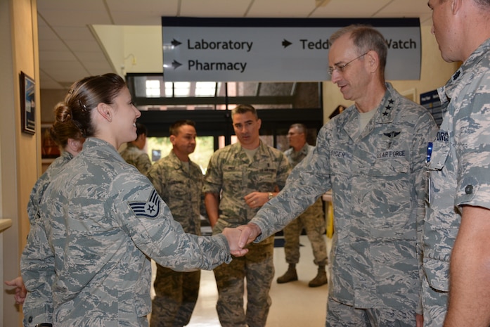 Lt Gen Ediger shaking hands with SSgt Abigail Johannesson, 628th
Medical Operations Squadron

