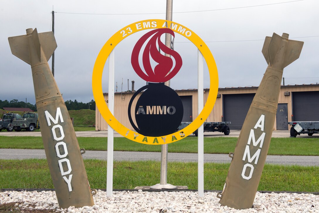 The 23d Equipment Maintenance Squadron munitions flight sign is displayed, Oct. 6, 2015, at Moody Air Force Base, Ga. The 23d EMS munitions inspectors provide overall maintenance for the base’s munitions stockpile by inspecting explosives, ensuring safety and complying with technical orders. (U.S. Air Force photo by Airman 1st Class Greg Nash/Released) 