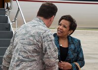 U.S. Attorney General Loretta Lynch is welcomed to Hanscom Air Force Base, Mass., by Col. Dale Vandusen, Battle Management deputy program executive officer, Oct. 2. Lynch was in the local area attending speaking engagements in Boston. (U.S. Air Force photo by Mark Herlihy)