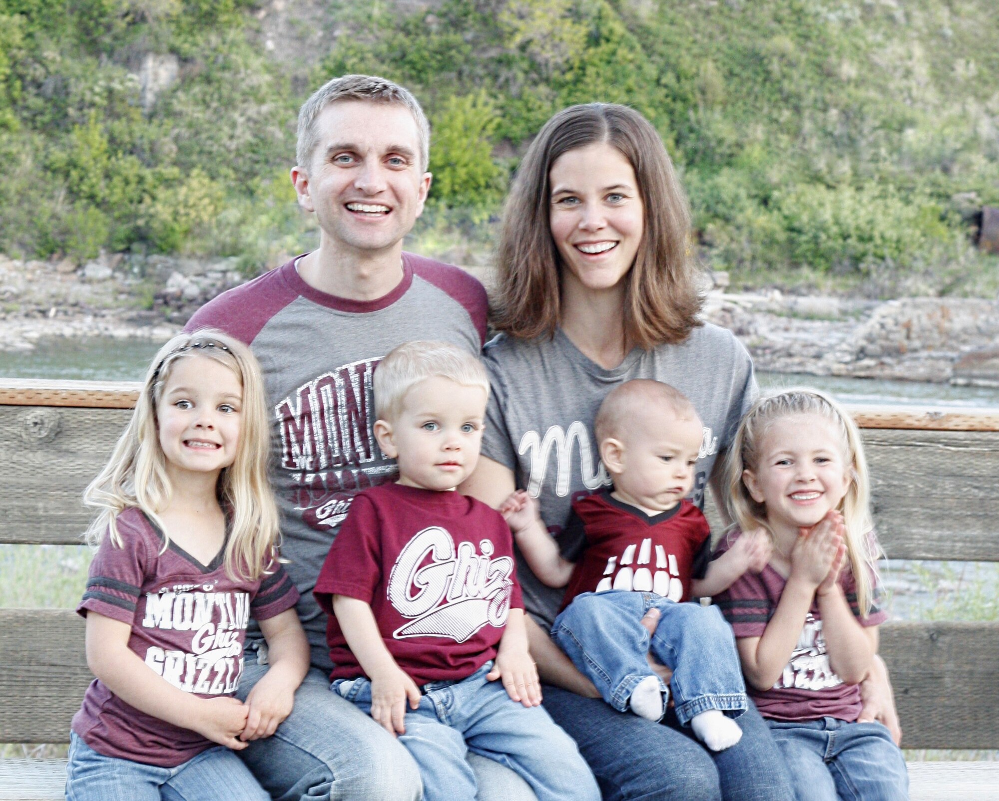 Capt. Clayton Cox, 341st Missile Wing assistant staff judge advocate, left, poses for a photograph with his family. Cox was recently selected to attend the U.S. Air Force International Squadron Officer School. (Courtesy photo)