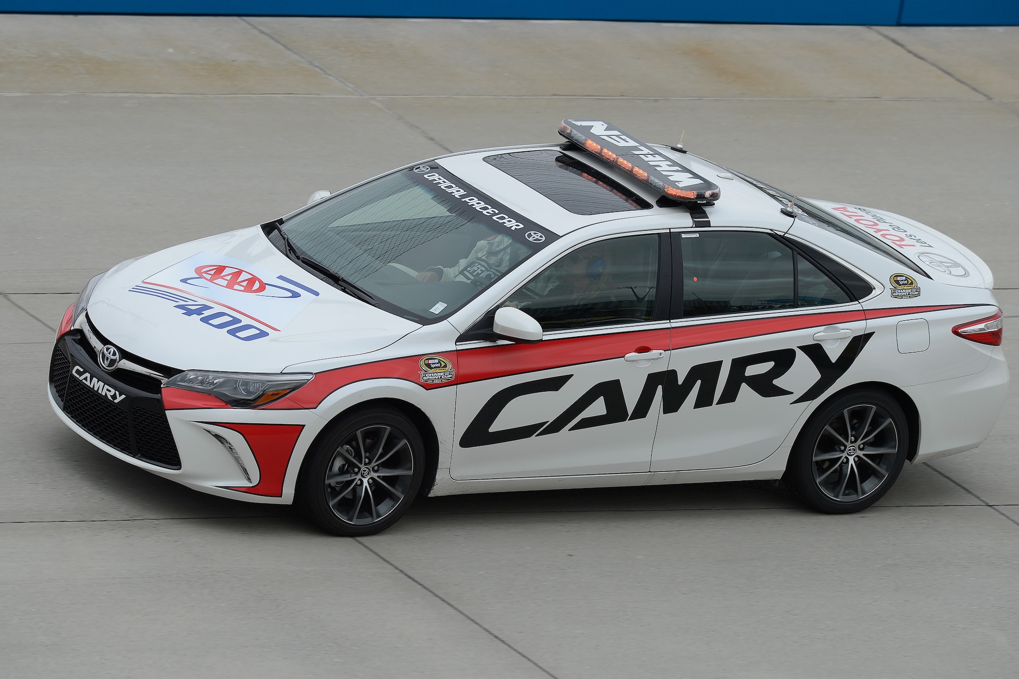 Secretary of the Air Force Deborah Lee James drives a specially marked 2015 Toyota Camry pace car as the 2015 AAA 400 NASCAR Sprint Cup Series race begins at Dover International Speedway Oct. 4, 2015, in Dover, Del. Secretary James was accompanied by a race official in the passenger seat as she led the first three pace laps prior to the drivers getting the green flag to start racing. (U.S. Air Force photo/Greg L. Davis)