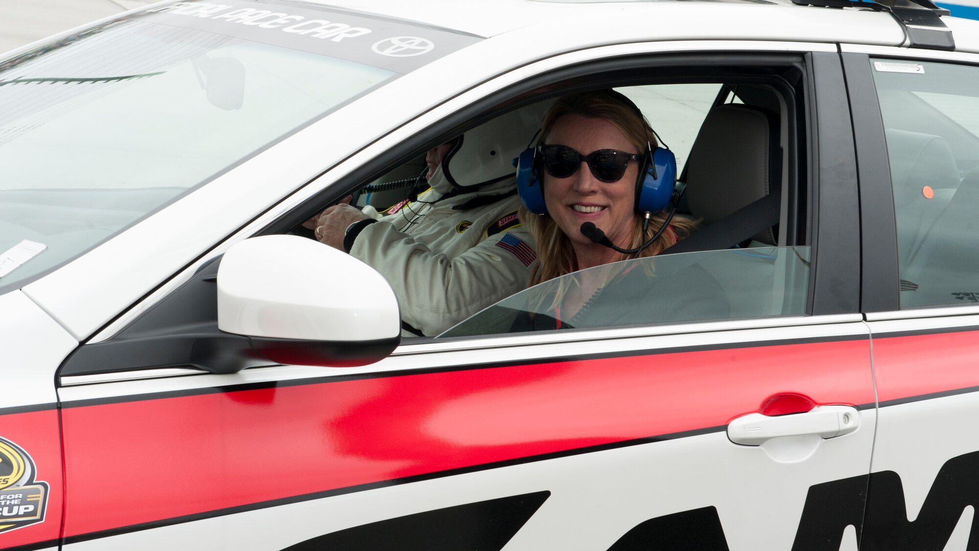 Secretary of the Air Force Deborah Lee James sits in the pace car’s driver seat prior to the start of the 2015 AAA 400 NASCAR Sprint Cup Series race Oct. 4, 2015, at Dover International Speedway in Dover, Del. Secretary James drove the pace car 3 laps at the start the 400 mile race. (U.S. Air Force photo/Senior Airman Zachary Cacicia)