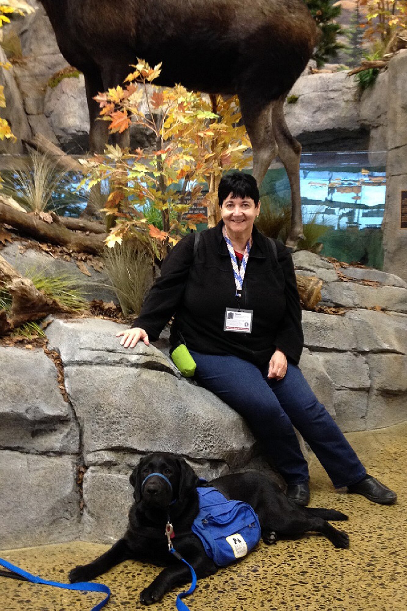 Marie Swain and her service dog in training, Taylor, pose for a photo earlier this year in Hudson, Mass. October is National Disability Employment Awareness Month, an annual campaign that educates people about disability employment issues. The theme for this year, which marks 70 years since the first observance, is "My Disability is One Part of Who I Am." (Courtesy photo)