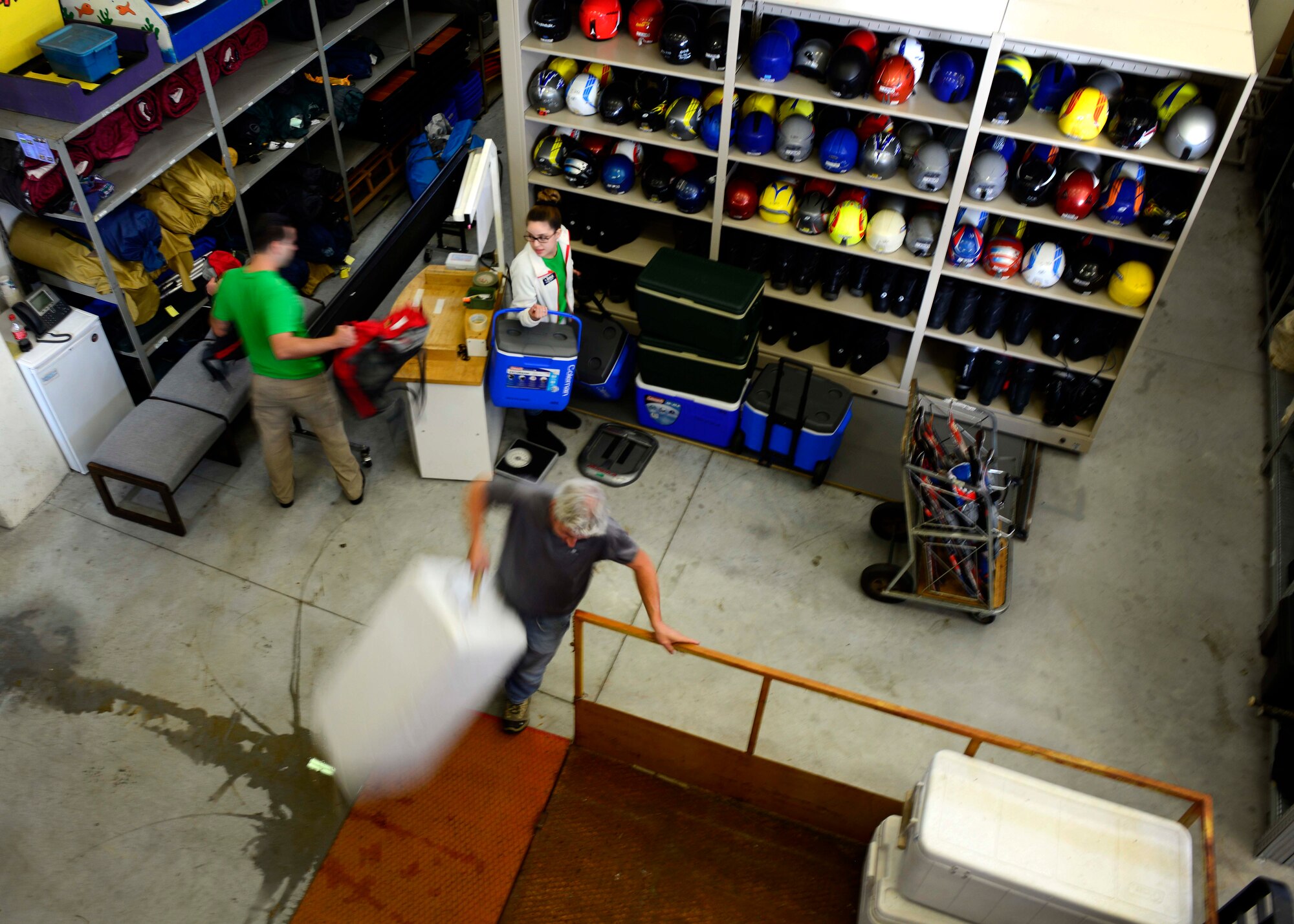 Staff members assigned to the 31st Force Support Squadron Outdoor Recreation facility move summer items into storage in preparation of the upcoming winter season, Oct. 1, 205 at Aviano Air Base, Italy. Outdoor Recreation performs in-house maintenance for skis, snowboards and bicycles. They are open Monday through Friday 10 a.m. to 6 p.m., Saturdays 10 a.m. to 3 p.m. and Family Days 10 a.m. to 2 p.m. (U.S. Air Force photo by Senior Airman Areca T. Bell/Released)
