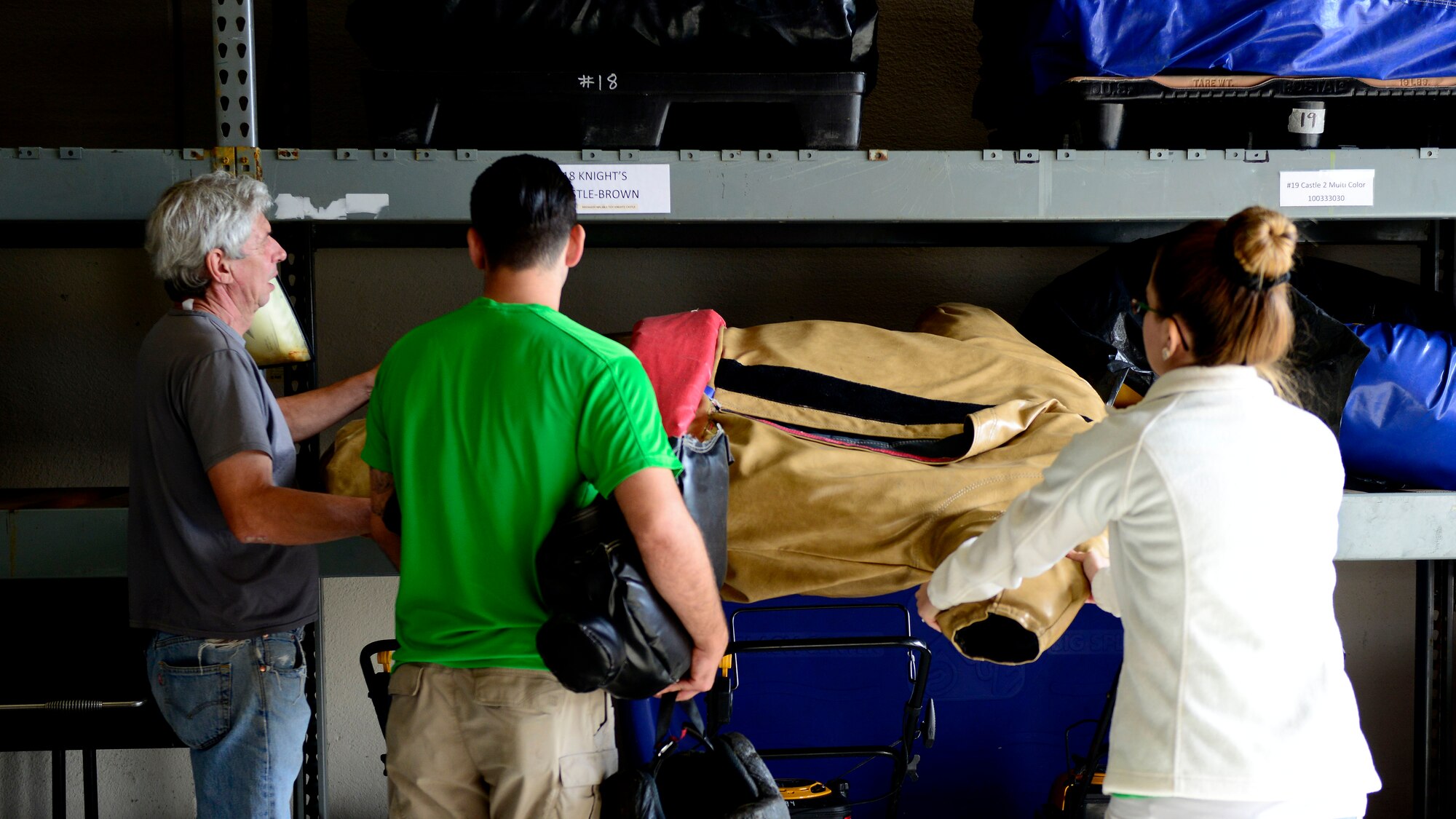 Staff members assigned to the 31st Force Support Squadron Outdoor Recreation facility put summer equipment away in preparation of the upcoming winter season, Oct. 1, 2015 at Aviano Air Base, Italy. Winter gear will be available for rent Nov. 1, 2015. (U.S. Air Force photo by Senior Airman Areca T. Bell/Released)