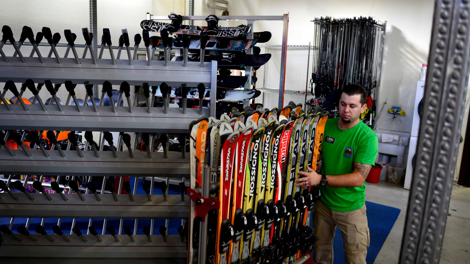Todd Spencer, 31st Force Support Squadron Outdoor Recreation facility operator, rearranges equipment in preparation of the upcoming winter season, Oct. 1, 2015 at Aviano Air Base, Italy. Winter equipment will be available for rent Nov. 1, 2015. (U.S. Air Force photo by Senior Airman Areca T. Bell/Released)