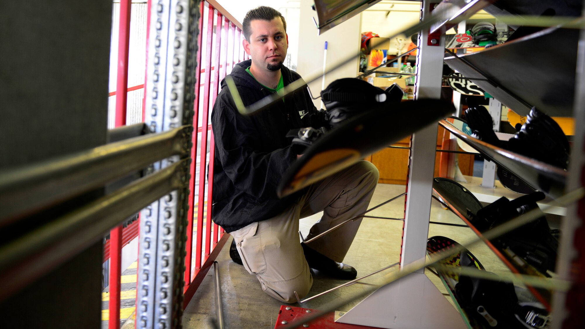 Todd Spencer, 31st Force Support Squadron Outdoor Recreation facility operator, checks winter gear inventory, Oct. 1, 2015 at Aviano Air Base, Italy. Staff members are responsible for equipment upkeep and helping customers with summer and winter rentals. (U.S. Air Force photo by Senior Airman Areca T. Bell/Released)