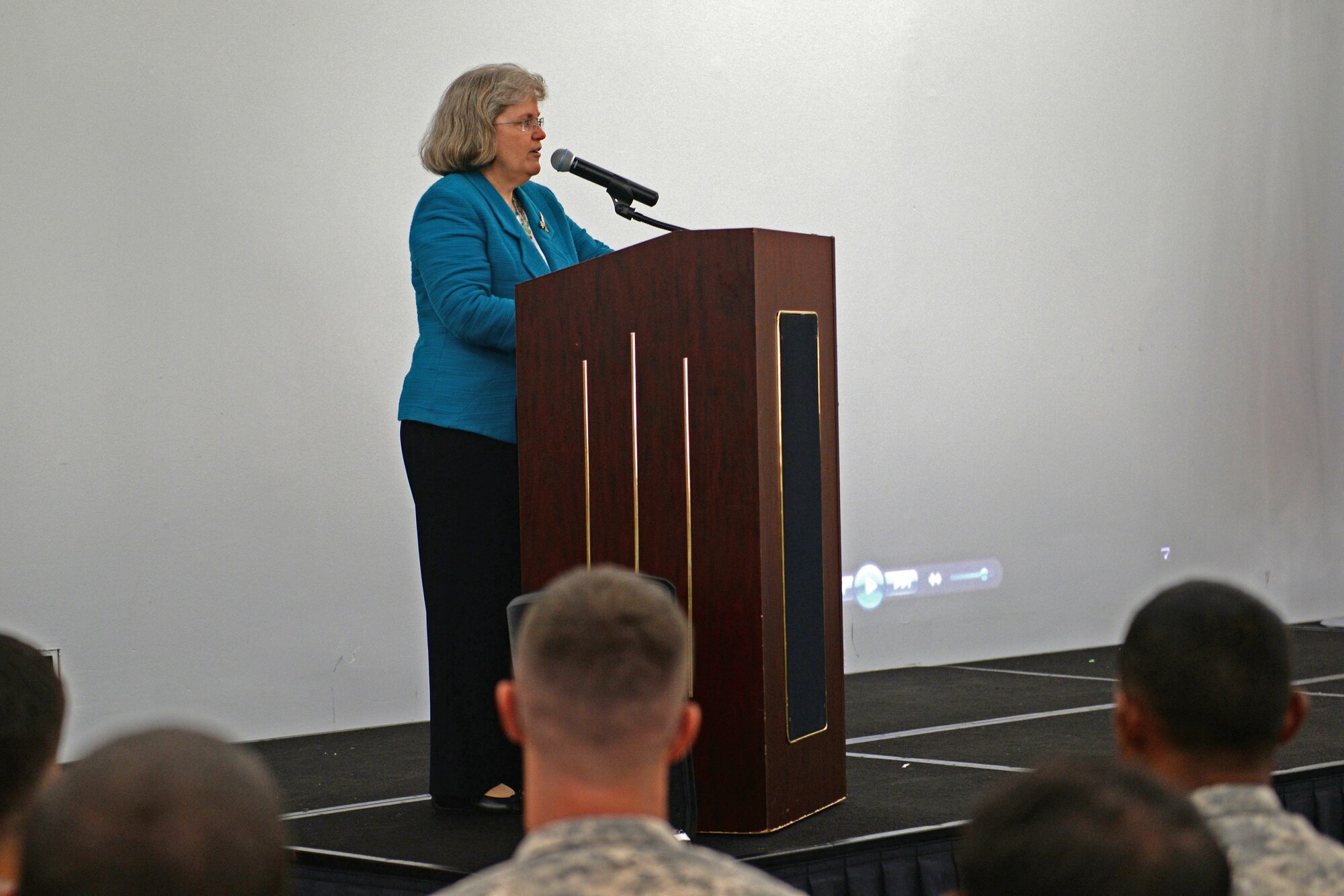 Holly Petraeus, Consumer Financial Protection Bureau assistant director, briefs military members about the importance of making sound financial decisions Oct. 6, 2015, at Andersen Air Force Base, Guam. Petraeus visited military installations on Guam to inform service members and their families about the mission of the Consumer Financial Protection Bureau. (U.S. Air Force photo by Airman 1st Class Alexa Ann Henderson/Released)