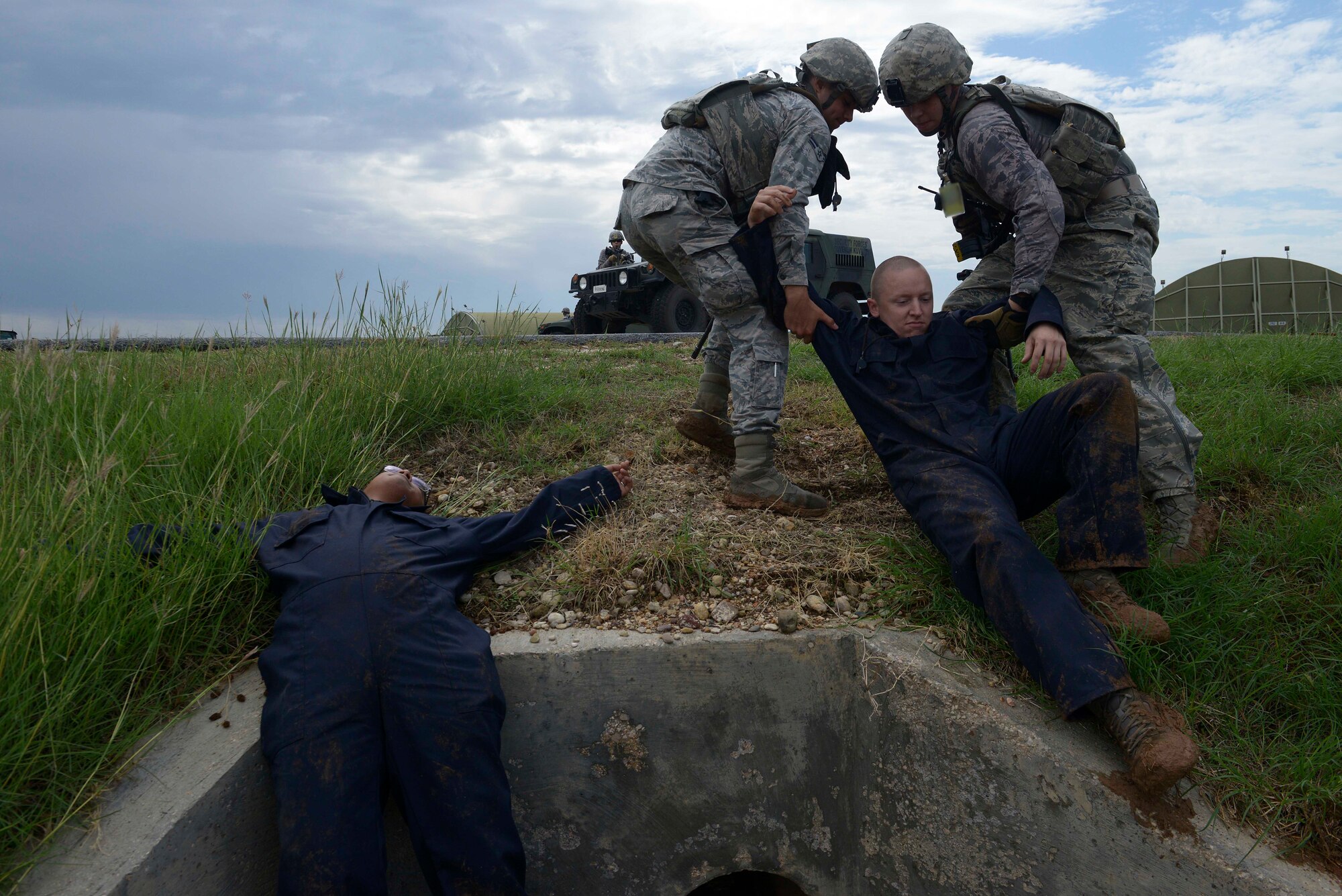 Airmen from the 39th Security Forces Squadron search for simulated causalities after defending a convoy from a mock ambush during a wing-wide exercise Oct. 2, 2015, at Incirlik Air Base, Turkey. The exercise was held so the base’s first responders could hone their skills and readiness to respond to an emergency situation. (U.S. Air Force photo by Senior Airman Krystal Ardrey/Released)