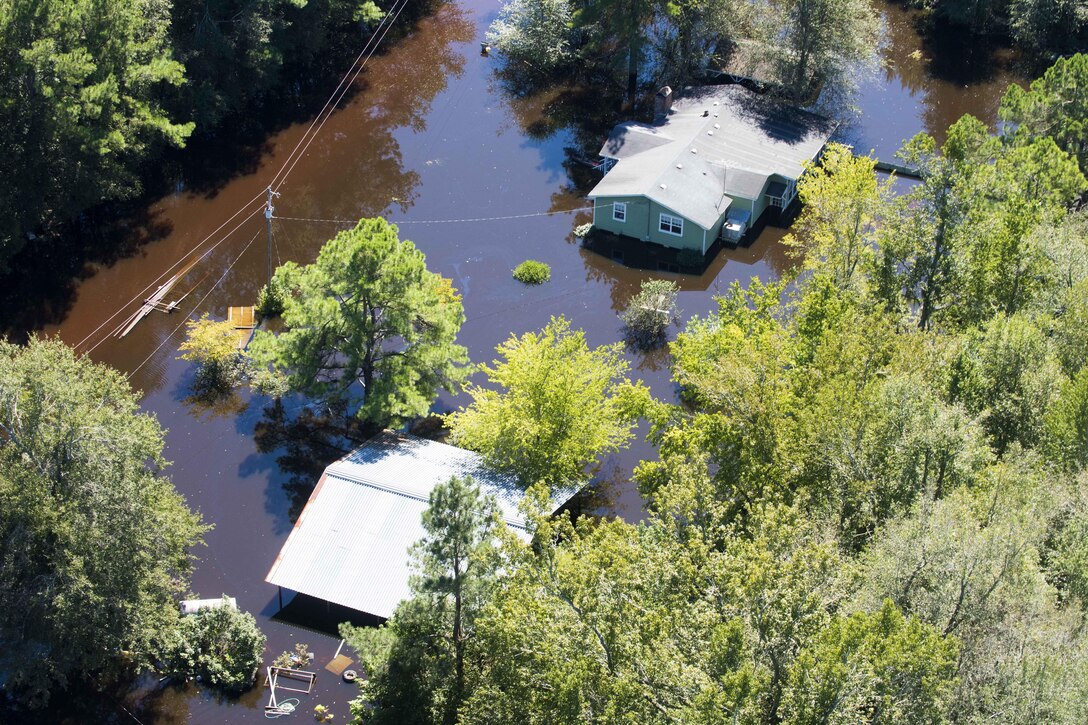 An aerial view taken from a Coast Guard helicopter shows the continuing effects of flooding caused by Hurricane Joaquin in the South Carolinian counties of Berkley and Williamsburg, S.C., Oct. 7, 2015. U.S. Coast Guard photo by Petty Officer 1st Class Stephen Lehmann  