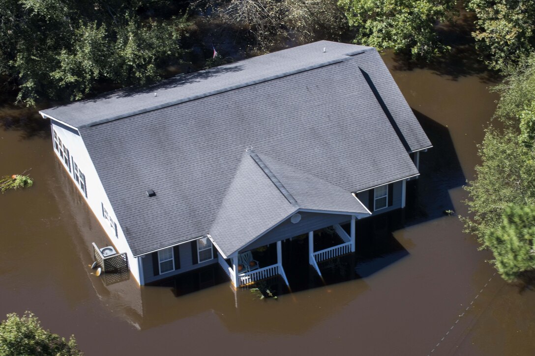 An aerial view taken from a Coast Guard helicopter shows the continuing effects of flooding caused by Hurricane Joaquin in the South Carolinian counties of Berkley and Williamsburg, S.C., Oct. 7, 2015. U.S. Coast Guard photo by Petty Officer 1st Class Stephen Lehmann  