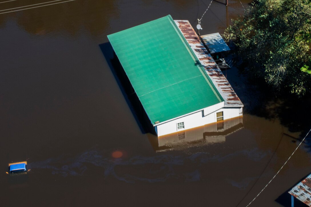 An aerial view taken from a Coast Guard helicopter shows the continuing effects of flooding caused by Hurricane Joaquin in the South Carolinian counties of Berkley and Williamsburg, S.C., Oct. 7, 2015. U.S. Coast Guard photo by Petty Officer 1st Class Stephen Lehmann  